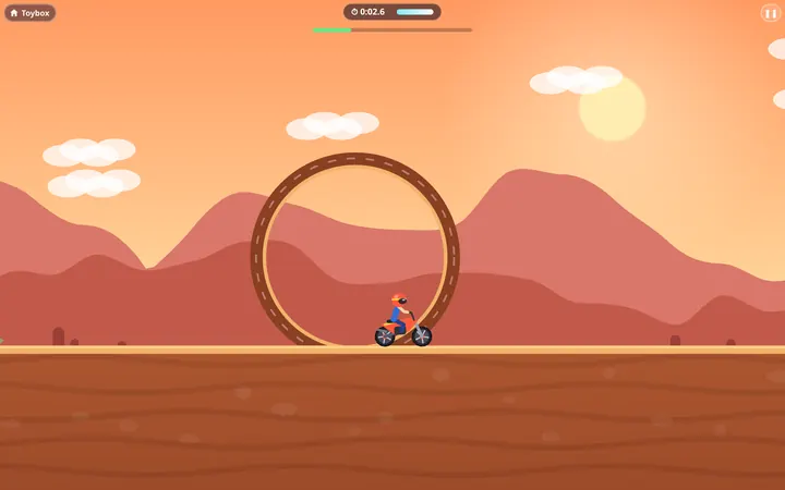 A stunt bike rider jumping over desert hills toward a loop